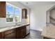 Kitchen boasts granite countertops, stainless steel appliances, and ample cabinet space at 250 Lytham Se Dr, Mableton, GA 30126