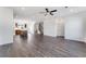 Spacious open-concept living room features hardwood floors, recessed lighting, and seamless flow to kitchen at 250 Lytham Se Dr, Mableton, GA 30126
