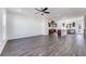 Open-concept living space combines the living room and kitchen, with hardwood floors throughout at 250 Lytham Se Dr, Mableton, GA 30126
