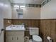 Bathroom with traditional style vanity and wood paneling at 731 Willow Ridge Dr, Marietta, GA 30068