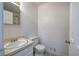 Small bathroom with toilet, sink and vanity at 731 Willow Ridge Dr, Marietta, GA 30068