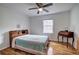 Bedroom with wooden floors, a ceiling fan and a double bed at 731 Willow Ridge Dr, Marietta, GA 30068