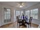 Cozy dining area featuring a bay window, hardwood floors, a ceiling fan and plenty of natural light at 731 Willow Ridge Dr, Marietta, GA 30068