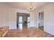 Spacious dining room featuring hardwood floors and a seamless flow into other living spaces at 731 Willow Ridge Dr, Marietta, GA 30068