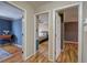 Hallway with hardwood floors and access to bedrooms at 731 Willow Ridge Dr, Marietta, GA 30068