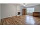 Bright living room features a fireplace, hardwood floors, and large windows at 731 Willow Ridge Dr, Marietta, GA 30068