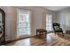 Cozy living room featuring hardwood floors and large windows for abundant natural light at 731 Willow Ridge Dr, Marietta, GA 30068