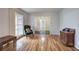Inviting living room featuring hardwood floors, large windows and access to the foyer at 731 Willow Ridge Dr, Marietta, GA 30068