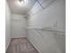 Functional walk-in closet with shelving for storage and organization at 731 Willow Ridge Dr, Marietta, GA 30068