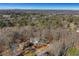 Aerial view highlighting home's landscape and setting at 4571 Deep Creek Dr, Sugar Hill, GA 30518