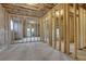 Unfinished basement with framed walls and future door at 4571 Deep Creek Dr, Sugar Hill, GA 30518