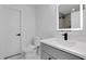 Modern bathroom with grey vanity and marble flooring at 4571 Deep Creek Dr, Sugar Hill, GA 30518