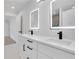 Modern bathroom with double vanity, quartz countertops, and LED mirrors at 4571 Deep Creek Dr, Sugar Hill, GA 30518