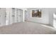 Bright bedroom with carpeted floors and large closet at 4571 Deep Creek Dr, Sugar Hill, GA 30518