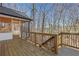 Deck with screen porch and wooded view at 4571 Deep Creek Dr, Sugar Hill, GA 30518