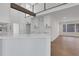 Modern white kitchen with white shaker cabinets and quartz countertops at 4571 Deep Creek Dr, Sugar Hill, GA 30518