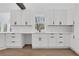 Modern white kitchen with white shaker cabinets and quartz countertops at 4571 Deep Creek Dr, Sugar Hill, GA 30518