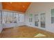 Spacious screened porch with wooden deck and access to backyard at 4571 Deep Creek Dr, Sugar Hill, GA 30518