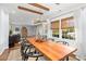 A long dining table with exposed wooden beams at 1260 Amanda Cir, Decatur, GA 30033