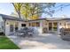 Spacious patio with dining furniture and grill, perfect for outdoor entertaining at 1260 Amanda Cir, Decatur, GA 30033