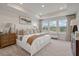 Main bedroom with large windows and tray ceiling at 237 Lytham Se Dr, Mableton, GA 30126