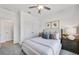 Light and airy bedroom with a queen bed, double door closet and neutral decor at 3136 Morris Hills Dr, Dacula, GA 30019