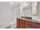 Cozy bathroom with granite vanity, ceramic tile, shower and toilet at 1280 W Peachtree Nw St # 3009, Atlanta, GA 30309