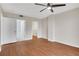 Bedroom with ceiling fan, wood floors, walk-in closet, and bathroom at 1280 W Peachtree Nw St # 3009, Atlanta, GA 30309