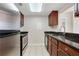 Bright kitchen with stainless steel appliances and stone countertops at 1280 W Peachtree Nw St # 3009, Atlanta, GA 30309