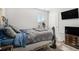 Simple bedroom with a double bed and a TV at 6292 Hickory Lane Cir, Union City, GA 30291