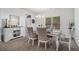 Elegant dining room featuring a beautiful table and chairs, and plenty of natural light at 6292 Hickory Lane Cir, Union City, GA 30291