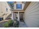 Inviting front porch with brick columns and landscaping at 6292 Hickory Lane Cir, Union City, GA 30291