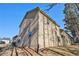 Side view of tan house with large windows at 6292 Hickory Lane Cir, Union City, GA 30291