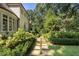 Well-manicured backyard with stone pathway and lush greenery at 4345 Mount Paran Nw Pkwy, Atlanta, GA 30327