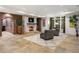 Finished basement with stone fireplace, neutral flooring, and large windows offering a comfortable living space at 4345 Mount Paran Nw Pkwy, Atlanta, GA 30327