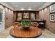 Basement features a bar with wood countertop and backsplash, and a round table, perfect for entertaining at 4345 Mount Paran Nw Pkwy, Atlanta, GA 30327