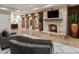 Cozy basement featuring a fireplace, stone accents, and an open layout perfect for entertaining or relaxing at 4345 Mount Paran Nw Pkwy, Atlanta, GA 30327