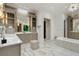 A primary bathroom includes marble countertops, vanity, and patterned ottoman at 4345 Mount Paran Nw Pkwy, Atlanta, GA 30327