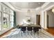 Bright dining room features a decorative ceiling, chandelier, and large windows with natural light at 4345 Mount Paran Nw Pkwy, Atlanta, GA 30327