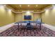 This game room is complete with a ping pong table, recessed lights and custom carpet at 4345 Mount Paran Nw Pkwy, Atlanta, GA 30327