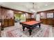 This game room features a pool table and custom wall treatments, perfect for entertaining guests at 4345 Mount Paran Nw Pkwy, Atlanta, GA 30327