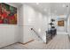 A long hallway with patterned carpet, and unique light fixtures creates an elegant atmosphere at 4345 Mount Paran Nw Pkwy, Atlanta, GA 30327