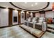 This home theater offers tiered seating, custom lighting, and luxurious finishes at 4345 Mount Paran Nw Pkwy, Atlanta, GA 30327