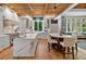 Spacious open concept kitchen with marble countertops, large island, hardwood floors, and stainless steel appliances at 4345 Mount Paran Nw Pkwy, Atlanta, GA 30327