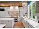Gourmet kitchen with stainless steel appliances, custom cabinetry, marble countertops, and decorative backsplash at 4345 Mount Paran Nw Pkwy, Atlanta, GA 30327