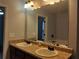 Bathroom with double vanity and large mirror at 5462 Union Hill Ct, Union City, GA 30291