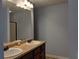 Double vanity bathroom with large mirror at 5462 Union Hill Ct, Union City, GA 30291