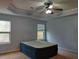 Spacious bedroom with ceiling fan and two windows at 5462 Union Hill Ct, Union City, GA 30291