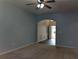 Light-filled living room showcasing neutral paint and carpeting at 5462 Union Hill Ct, Union City, GA 30291