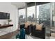 Modern living room featuring city views, hardwood floors, and comfortable seating at 855 Peachtree Ne St # 1508, Atlanta, GA 30308